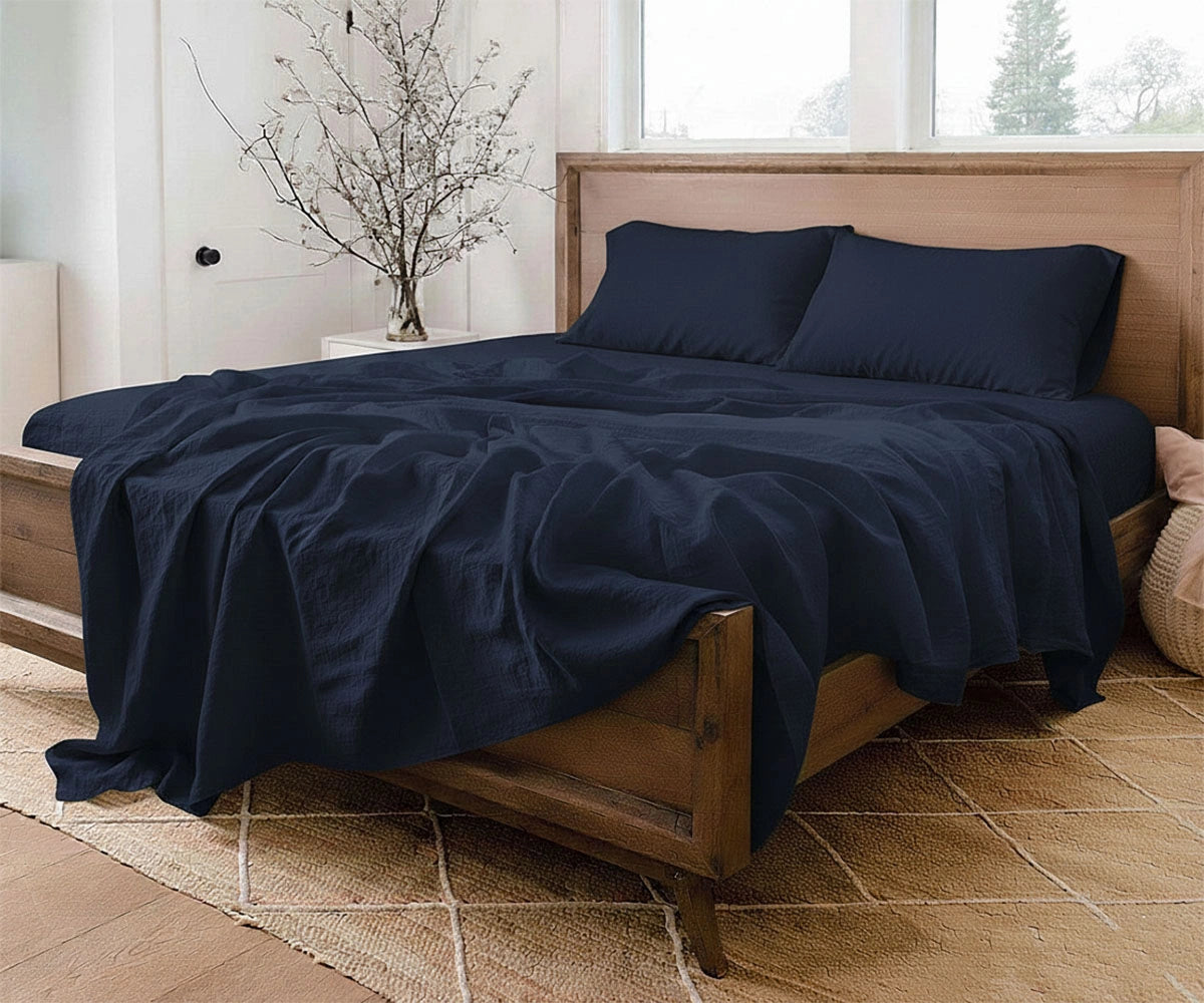 European Linen Sheet Set crafted from breathable 100%  pure soft bed linen for year-round, natural linen navy blue sheets layered with pillows