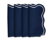 Navy blue scalloped edge cloth napkins with white trim made from 100% cotton for elegant wedding tables, holiday dining, and modern farmhouse table décor.