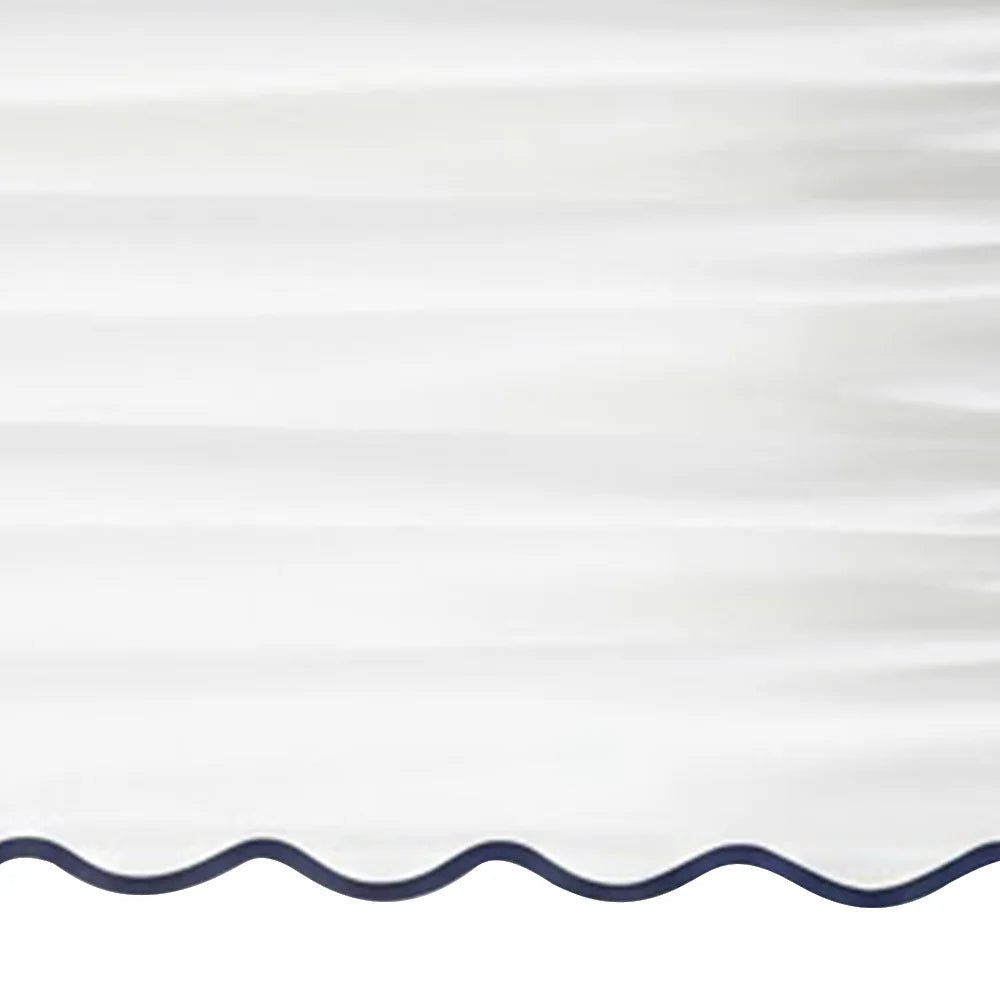 White scalloped curtain panel with navy blue trim - Close up