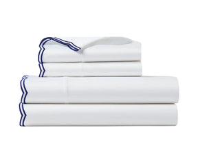 Navy blue 100% cotton scalloped edge bedding sheet set in King size – includes fitted sheet, flat sheet, and two pillowcases.