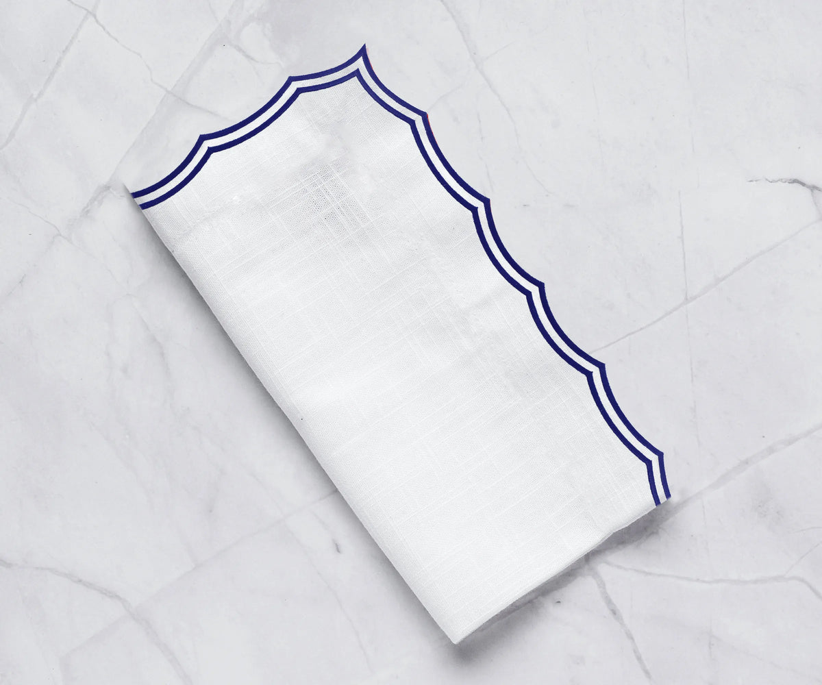 Navy cotton embroidered napkins with scalloped edges