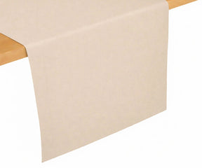Beige cotton table runner draped on wooden table, warm neutral table décor for casual and formal dining spaces