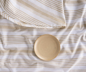 Natural cotton round tablecloth in beige and white stripes for everyday dining