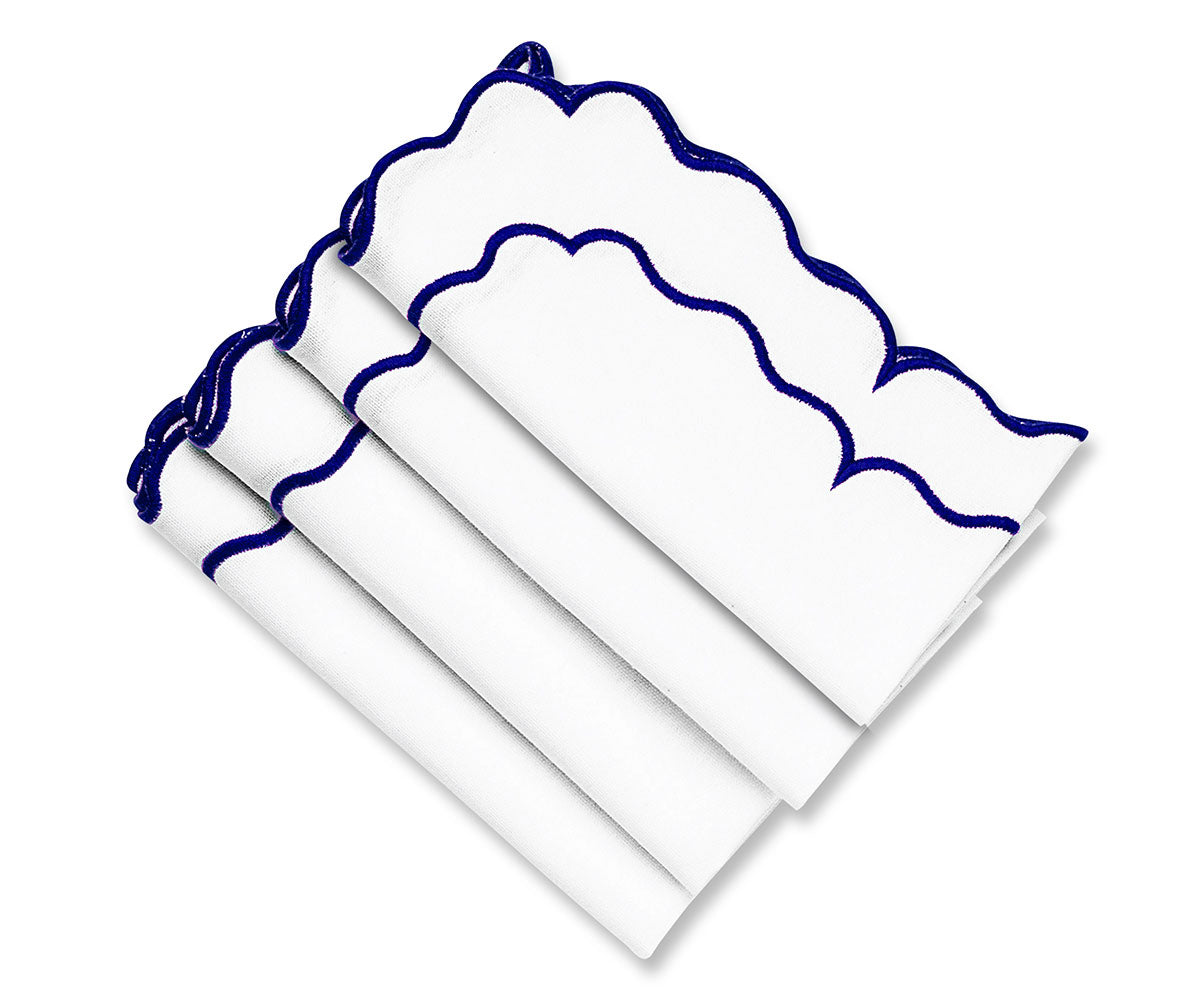 Blue Scalloped cloth napkins showcasing intricate scalloped edges for a luxurious feel."