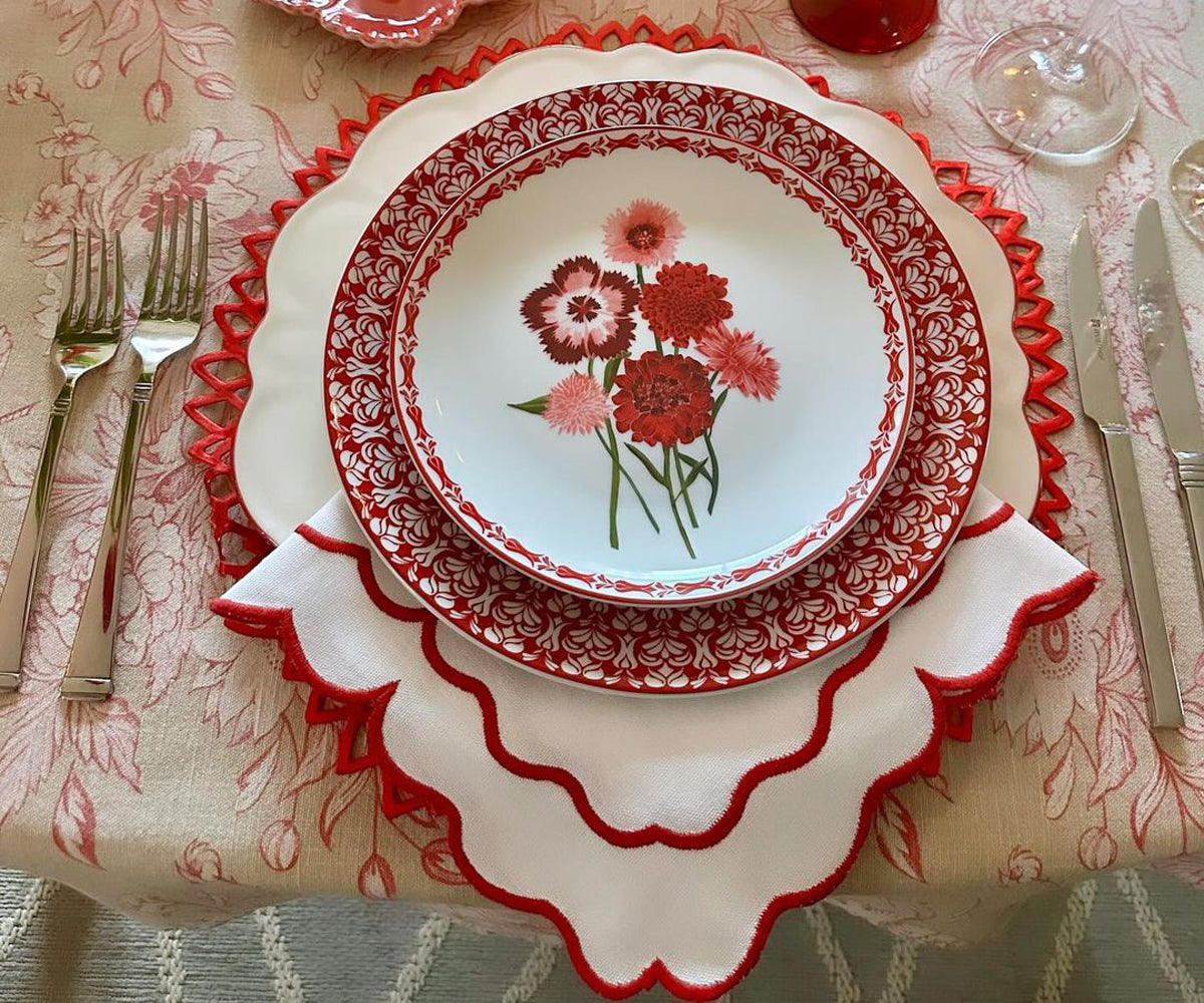 Set of red linen napkins, adding a subtle pop of color to your table setting.