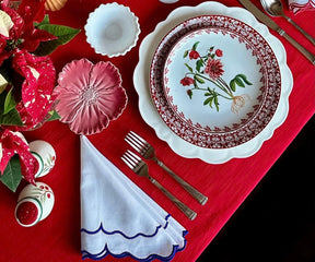 Royal Blue Scalloped edge linen napkins offering a blend of elegance and durability.