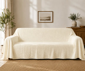 Linen sofa protector made from breathable natural fabric for year-round comfort and durability.