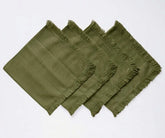 Cotton cloth napkin set with fringed borders, sustainable alternative to disposable napkins for eco-friendly dining.