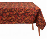 Vibrant orange floral block print cotton tablecloth on dining table