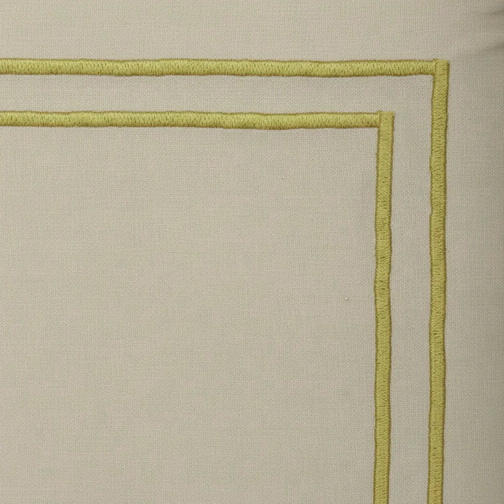 Neutral beige cotton dinner napkins with gold trim, reusable table linen