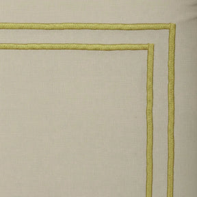 Neutral beige cotton dinner napkins with gold trim, reusable table linen