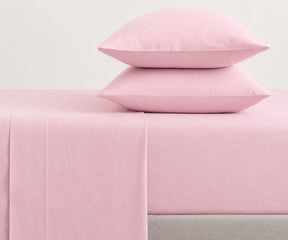 Shop Pastel Pink linen fitted sheet set made from European linen, soft pre-washed deep pocket bedding for modern bedrooms