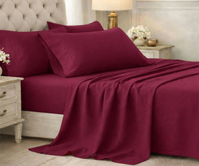 Burgundy cotton bedsheet set with rich, deep tone bedspread and sheet sets