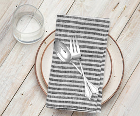 Premium 18x18 linen dinner napkins in black pinstripe design for formal and casual gatherings