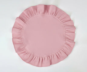 Pink round ruffled cotton napkins with soft linen texture, designed for elegant everyday dining and special table settings.