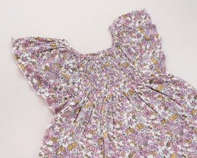 Adorable pink flower print baby girl dress – 100% cotton sleeveless frock for toddlers, perfect for parties and playtime.