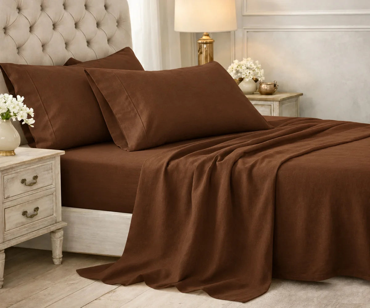 Solid coffee brown plain cotton bedding set styled on a bed in an elegant bedroom.