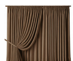 Dark Beige curtains with tieback in bright living room window