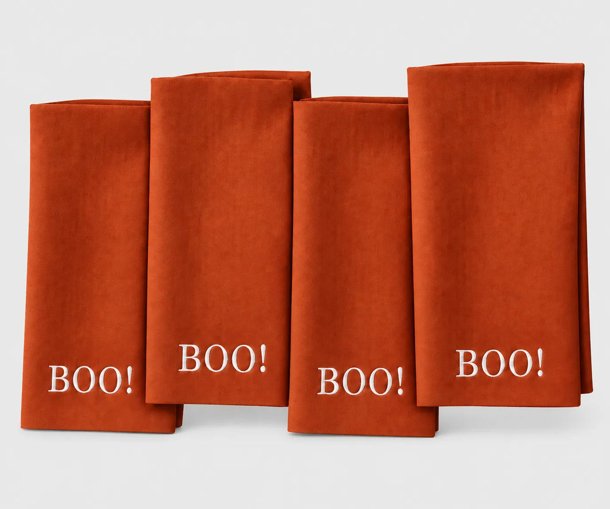 Rust Halloween cloth napkin with BOO design for fall and Halloween table decor Reusable table napkin for Halloween dinner parties, autumn gatherings, seasonal dining, and entertaining