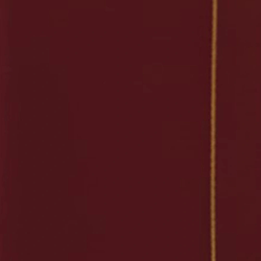 Wine red cotton napkin displayed flat with subtle embroidery, luxurious dining table accent