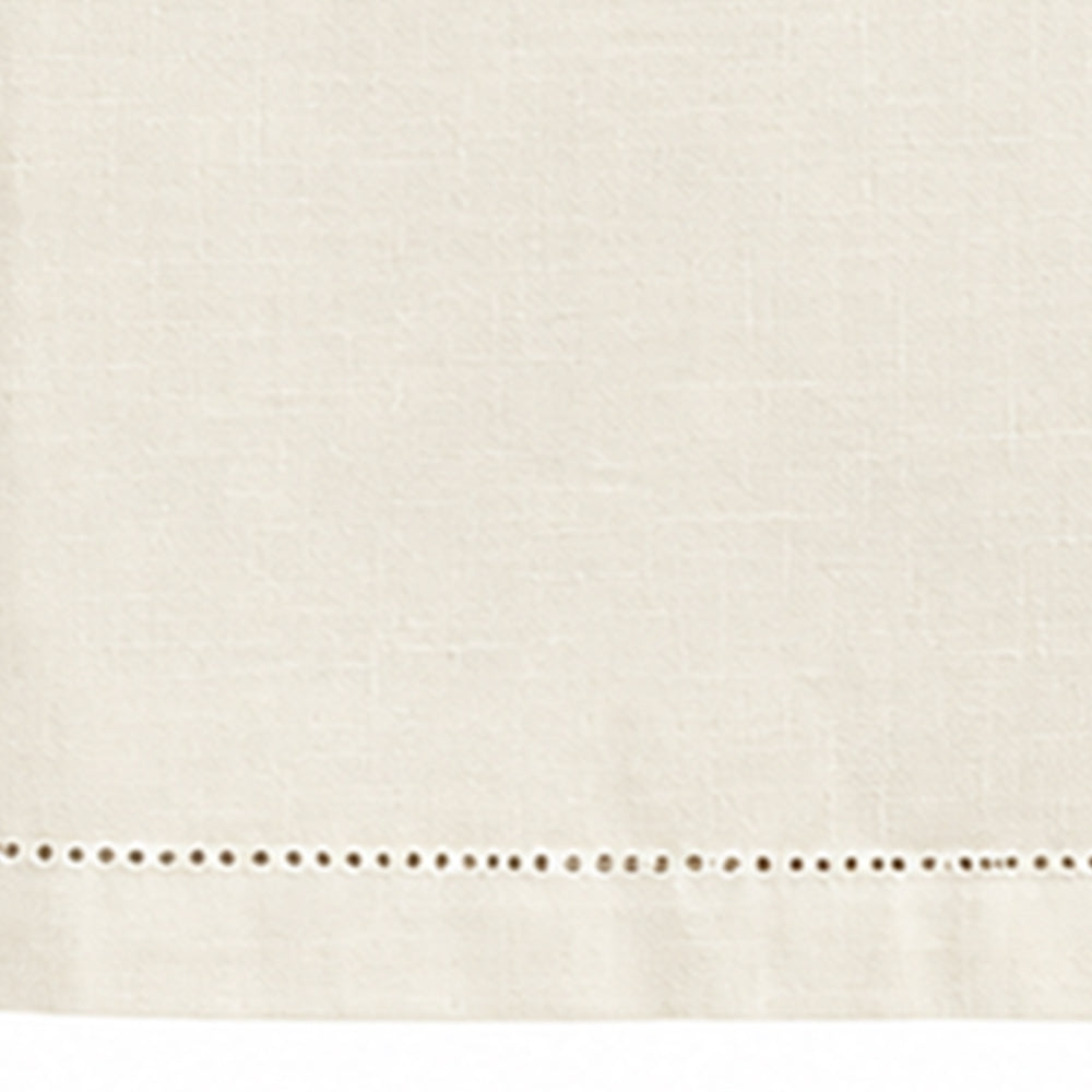 Close-up of ivory hemstitched cotton linen tablecloth fabric and border detail