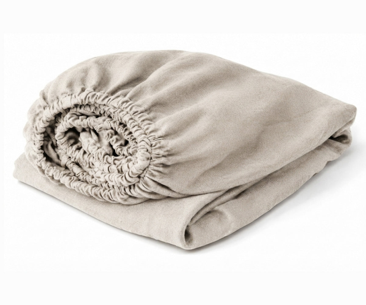 Natural European linen fitted sheet for luxury bedding, woven from 100% flax linen with deep pockets for a secure mattress fit and lasting comfort.