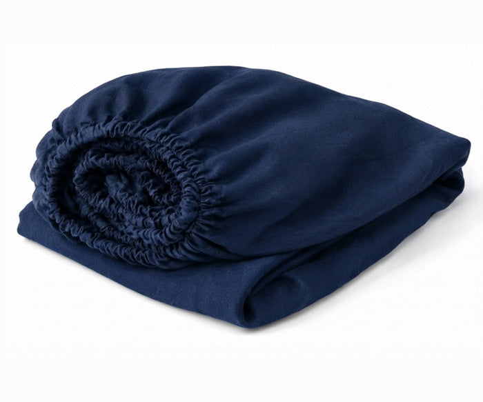 Navy Blue luxury linen fitted sheet made from 100% European linen with deep pockets, breathable cooling bedding for modern bedrooms.
