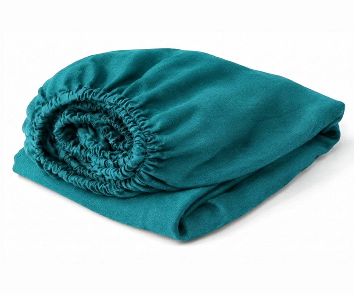 Teal 100% linen fitted sheet featuring deep pockets, European flax linen bedding designed for cool, breathable, and restful sleep.