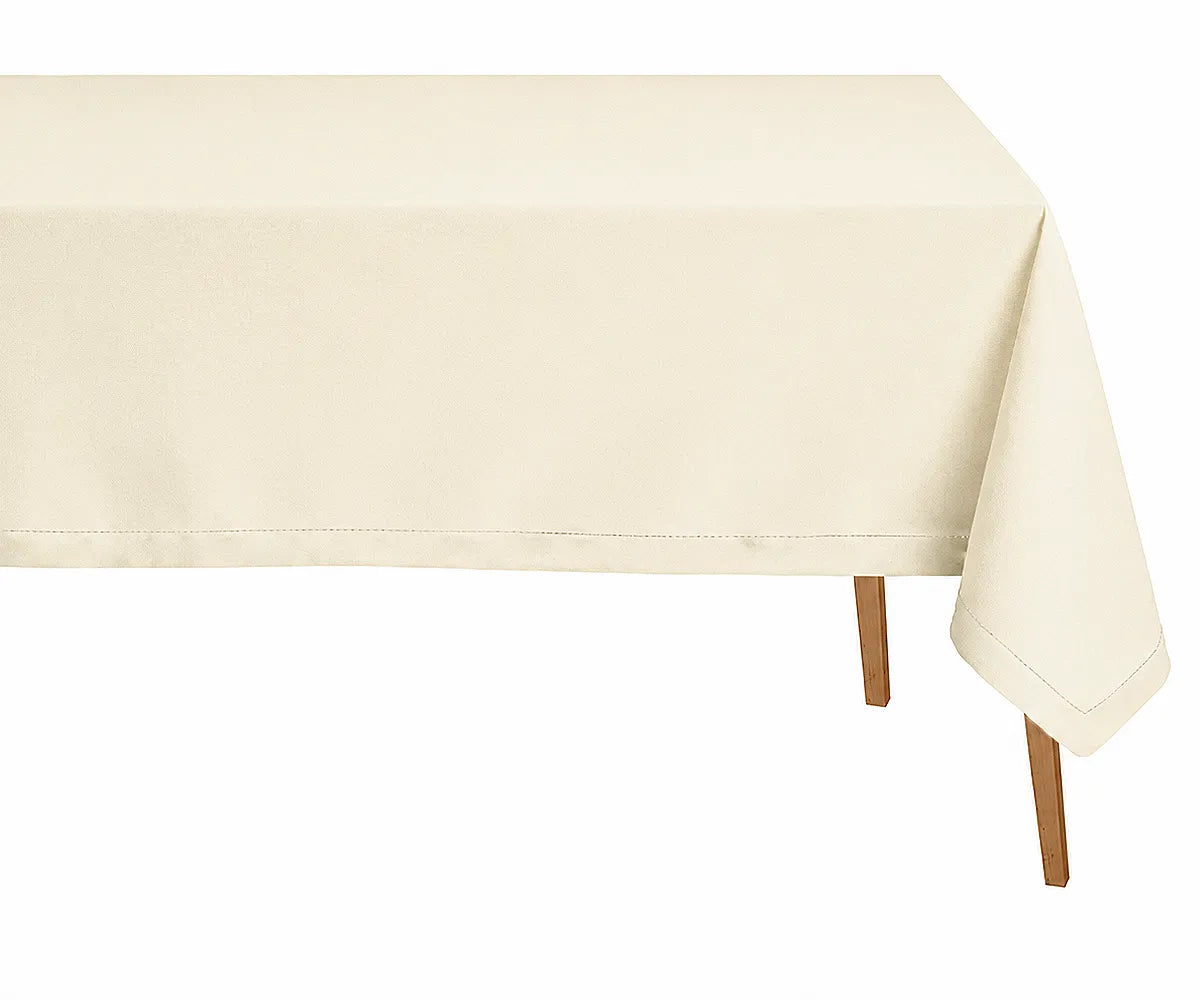 Ivory hemstitched linen dining tablecloth with soft elegant drape, ideal for wedding receptions, formal dining, and luxury table settings.