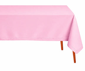 Soft pink rectangle linen tablecloth with elegant hemstitch border styled for romantic weddings, brunch tables, and modern dining spaces.