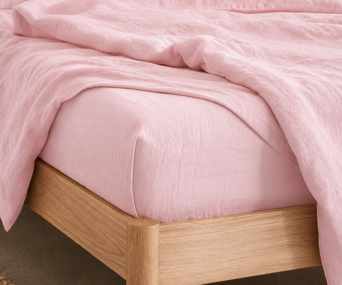 Pastel Pink European linen fitted sheet crafted from 100% flax linen with deep pockets, breathable luxury fitted bed sheet