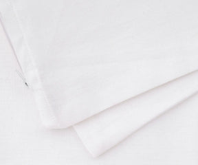 Plain white cotton-linen cushion covers for couch, bed, and lounge chairs