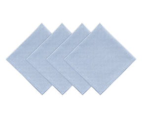 Reusable light blue cotton dinner napkins arranged with white dinnerware