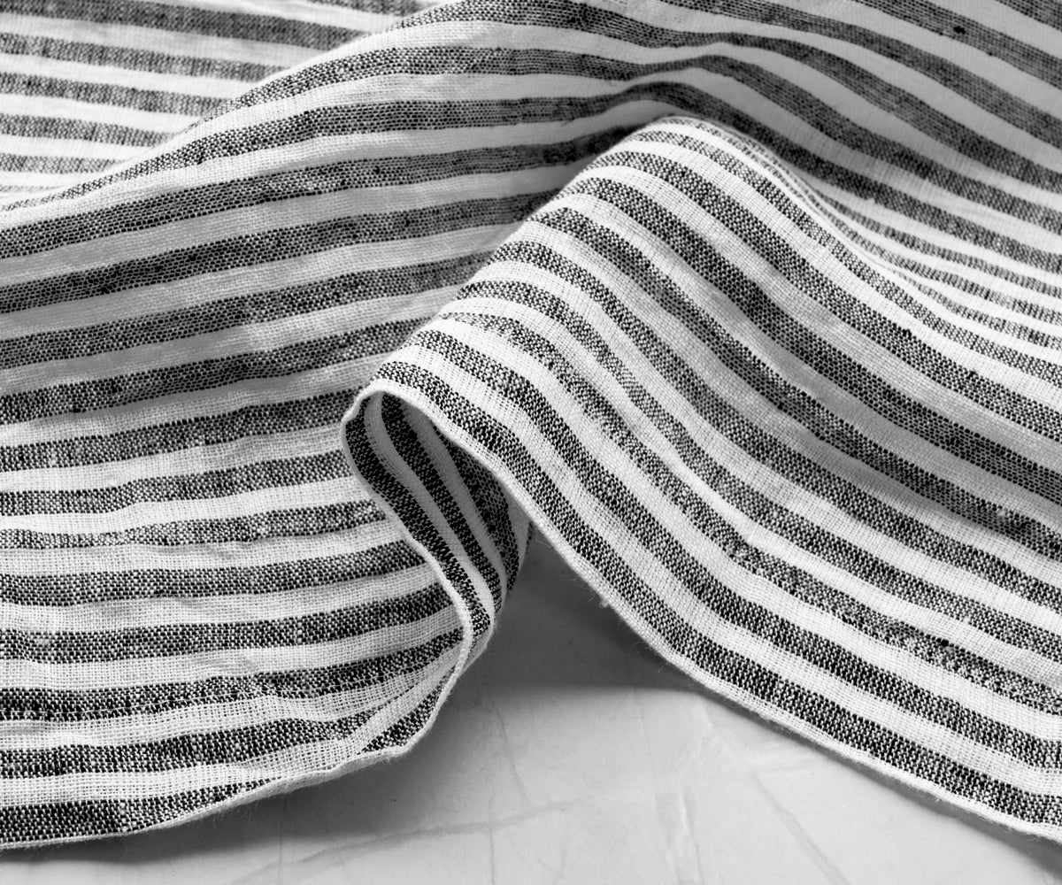 Premium black linen napkins designed for home entertaining, holiday meals, and dinner parties
