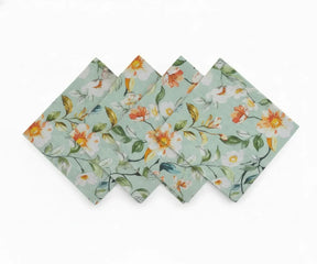 Natural linen cloth napkins with artisanal print paired with light blue napkins for table décor