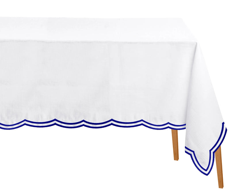 Royal blue cotton tablecloth styled for a sophisticated dining experience with Parisian flair