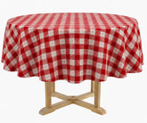 Round red and ivory snowflake check tablecloth crafted from cotton, featuring a festive gingham pattern ideal for holiday dining tables.