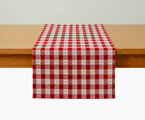 100% cotton Snowflake Check table runner in red and ivory featuring a festive checkered design with snowflake accents for Christmas and holiday table décor.