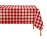 Red and ivory snowflake check rectangle tablecloth made from cotton, featuring a festive gingham pattern for holiday dining and farmhouse table decor.