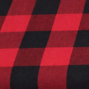 Close-up fabric swatch of a red and black buffalo check plaid pattern