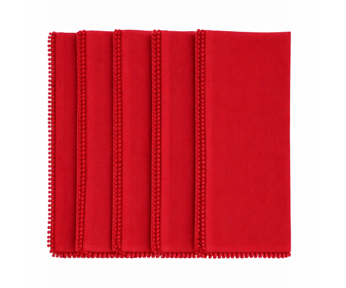 Red cotton pom pom napkins with knotted edge for festive and holiday table décor