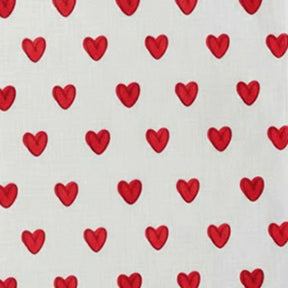 White tablecloth with small red heart pattern draped over a wooden table, shown in a media gallery with a thumbnail preview on the right - Close up