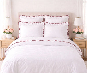 Red scalloped edge cotton bedding set with scalloped trim pillowcases and duvet cover for luxury modern bedroom