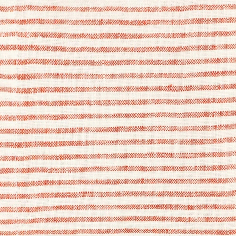 Close-up view of a red and white horizontal striped cotton fabric texture swatch.