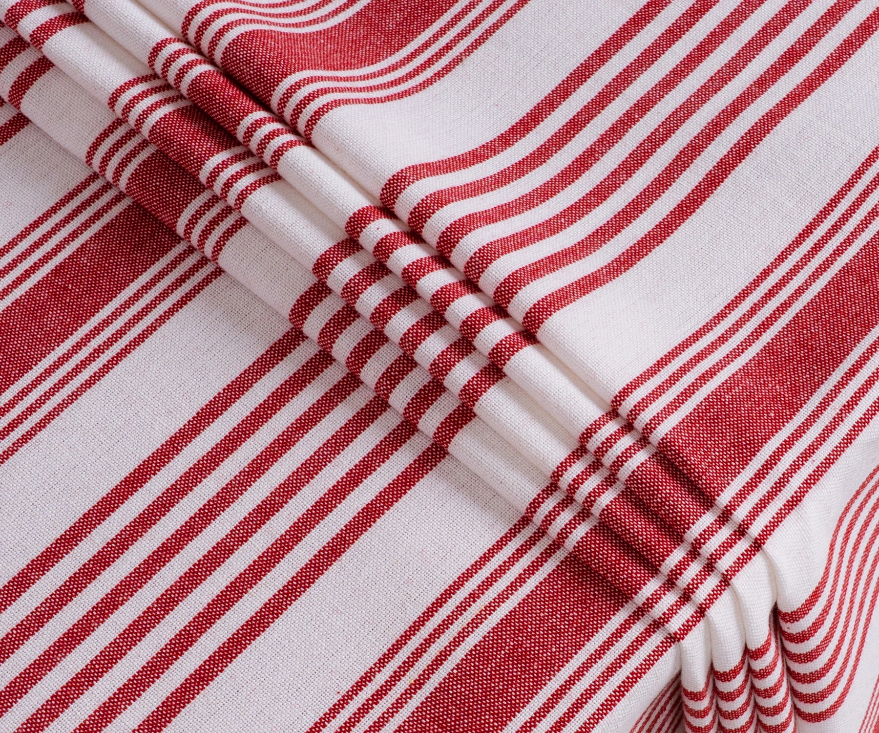 Festive red and white striped cotton tablecloth for holiday dinners and special gatherings