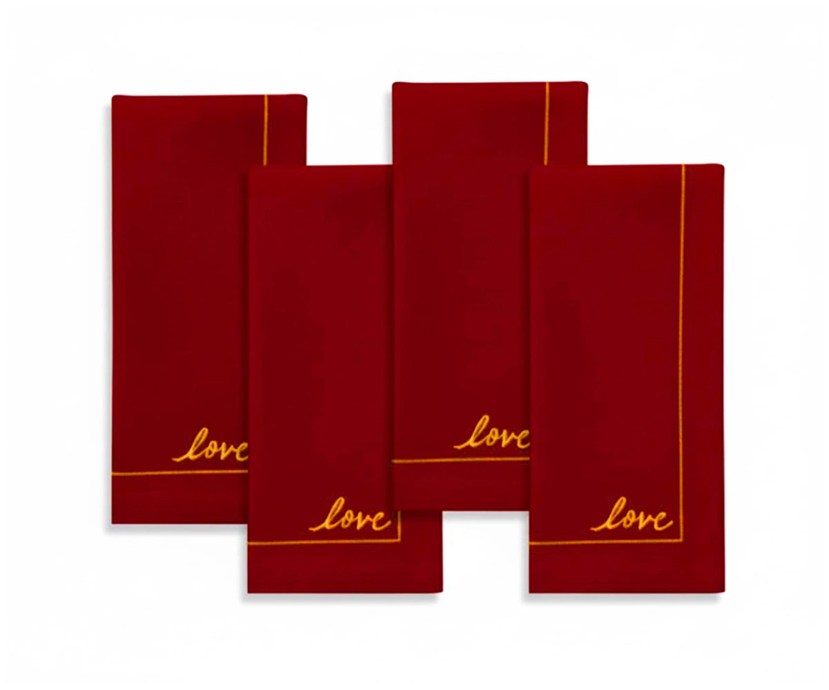 Deep red cotton cloth napkins with subtle embroidery, classic dining linens for festive and formal table décor