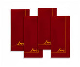 Deep red cotton cloth napkins with subtle embroidery, classic dining linens for festive and formal table décor