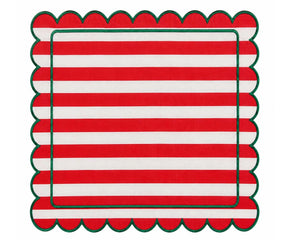 Red and white striped cloth napkin with scalloped edges and green trim for festive dining table decor