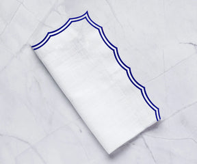 Elegant 100% cotton dinner napkins in royal blue for wedding table setting