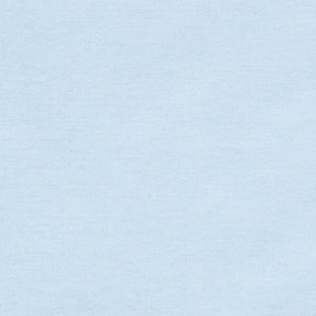 Soft plain pale blue napkins styled with dinnerware